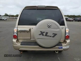 2006 Suzuki XL7 z VIN JS3TX92V564101429, wystawiony jako Copart lot #71942934 z przebiegiem 96 997 mil mil oraz Szkoda całkowita • Salvage title. Historia ofert i sprzedaży dostępna na DreamBid. Obrazek 6.