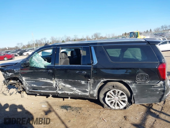 2023 GMC Yukon XL SLT z VIN 1GKS2GKT9PR208083, wystawiony jako IAAI lot #41285870 z przebiegiem 69 901 mil mil oraz . Historia ofert i sprzedaży dostępna na DreamBid. Obrazek 14.