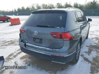 2018 Volkswagen Tiguan SEL Premium with VIN 3VV5B7AX9JM103745, listed as a IAAI auction lot 40993940 with 67,398 mi miles and . Bid and sale history available at DreamBid. Image 4.