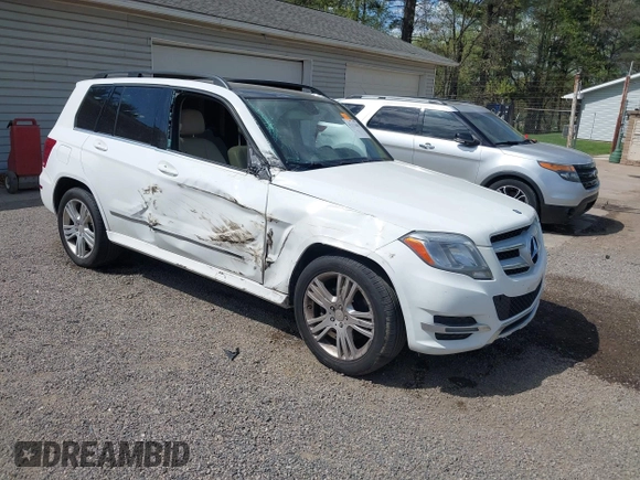 2014 Mercedes-Benz GLK 350 with VIN WDCGG8JB4EG310508, listed as a IAAI auction lot 42113403 with 125,859 mi miles and . Bid and sale history available at DreamBid. Image 1.