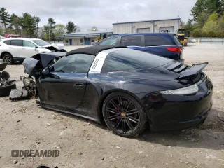 2016 Porsche 911 4S with VIN WP0BB2A94GS136383, listed as a Copart auction lot 52737084 with 54,027 mi miles and Salvage Title. Bid and sale history available at carsss.com. Image 2.