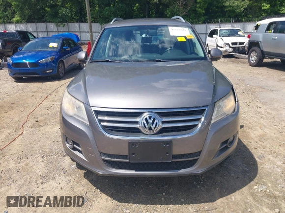 2011 Volkswagen Tiguan SEL z VIN WVGBV7AX5BW512203, wystawiony jako IAAI lot #42273838 z przebiegiem 157 072 mil mil oraz . Historia ofert i sprzedaży dostępna na DreamBid. Obrazek 12.