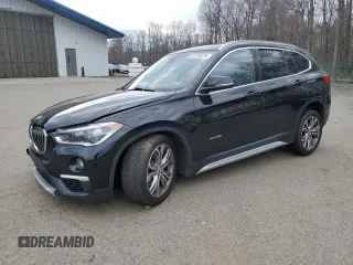 2016 BMW X1 xDrive28i z VIN WBXHT3C35GP882112, wystawiony jako Copart lot #53790235 z przebiegiem 115 050 mil mil oraz Szkoda całkowita • Salvage title. Historia ofert i sprzedaży dostępna na DreamBid. Obrazek 1.