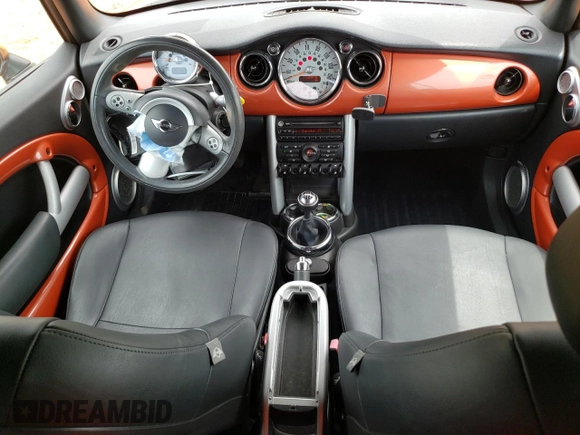 2006 MINI Convertible with VIN WMWRF335X6TF64910, listed as a Copart auction lot 60222215 with 85,761 mi miles and Salvage title. Bid and sale history available at DreamBid. Image 8.