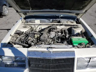 1982 Chrysler LeBaron z VIN 1C3BC55D3CG173312, wystawiony jako Copart lot #80800174 z przebiegiem 48 391 mil mil oraz Tytuł czysty. Historia ofert i sprzedaży dostępna na DreamBid. Obrazek 11.