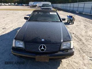 1997 Mercedes-Benz SL-Class with VIN WDBFA67F9VF146887, listed as a Copart auction lot 77166464 with 0 mi miles and Salvage Title. Bid and sale history available at carsss.com. Image 5.
