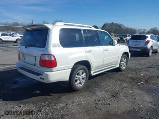 2005 Lexus LX 470 with VIN JTJHT00W653551986, listed as a IAAI auction lot 41575221 with 166,287 mi miles. Bid and sale history available at carsss.com. Image 4.