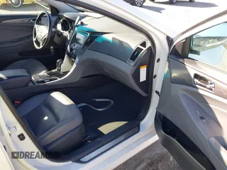 2013 Hyundai Sonata with VIN KMHEC4A45DA066755, listed as a IAAI auction lot 41892818 with 100,633 mi miles and . Bid and sale history available at carsss.com. Image 5.