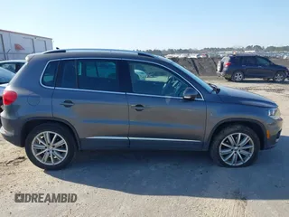 2012 Volkswagen Tiguan SE with VIN WVGAV7AX5CW000275, listed as a IAAI auction lot 41789246 with 123,618 mi miles and . Bid and sale history available at DreamBid. Image 15.