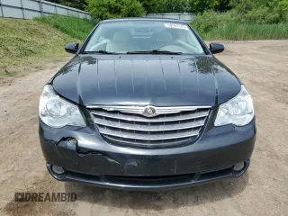 2008 Chrysler Sebring Limited z VIN 1C3LC65M08N676311, wystawiony jako Copart lot #58953125 z przebiegiem 157 212 mil mil oraz Czysty tytuł • Clean title. Historia ofert i sprzedaży dostępna na DreamBid. Obrazek 5.