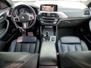 2020 BMW X4 xDrive30i z VIN 5UX2V1C0XL9B93562, wystawiony jako Copart lot #56180595 z przebiegiem 71 667 mil mil oraz Szkoda całkowita • Salvage title. Historia ofert i sprzedaży dostępna na DreamBid. Obrazek 8.