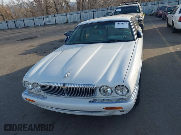 1998 Jaguar XJ Vanden Plas with VIN SAJKX6241WC829353, listed as a IAAI auction lot 41872667 with Not Provided miles and . Bid and sale history available at DreamBid. Image 6.