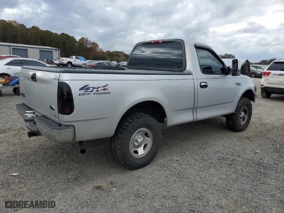 2004 Ford F-150 Heritage XL with VIN 2FTRF18284CA42951, listed as a Copart auction lot 79665784 with 160,293 mi miles and Salvage Title. Bid and sale history available at carsss.com. Image 3.