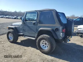 2002 Jeep Wrangler Sport with VIN 1J4FA49S22P703610, listed as a Copart auction lot 50900605 with 70,045 mi miles and Salvage Title. Bid and sale history available at carsss.com. Image 2.