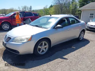2009 Pontiac G6 1SA z VIN 1G2ZG57N694226751, wystawiony jako IAAI lot #42140636 z przebiegiem 144 890 mil mil oraz . Historia ofert i sprzedaży dostępna na DreamBid. Obrazek 2.