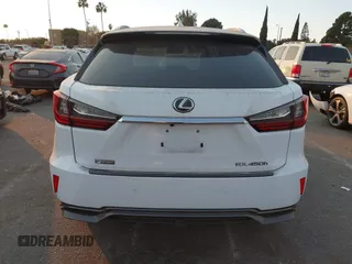 2019 Lexus RX with VIN 2T2BGMCAXKC036573, listed as a IAAI auction lot 41299079 with 104,568 mi miles. Bid and sale history available at carsss.com. Image 16.