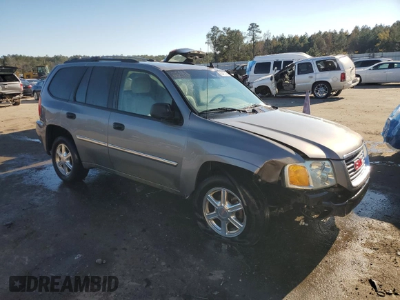2009 GMC Envoy SLE with VIN 1GKDS33SX92131159, listed as a Copart auction lot 82487404 with 224,391 mi miles and Salvage Title. Bid and sale history available at carsss.com. Image 4.