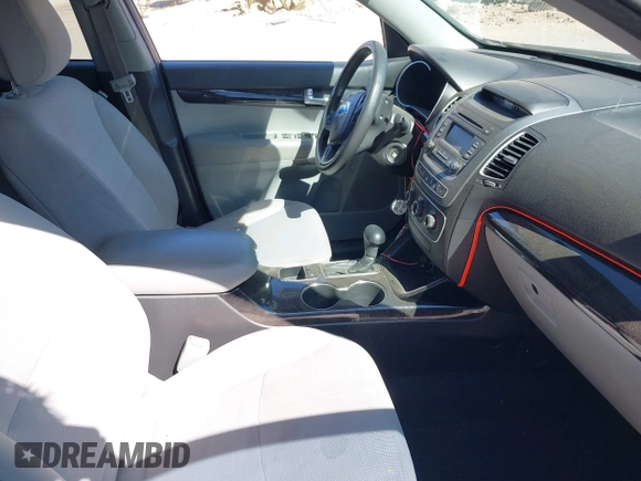 2014 Kia Sorento LX with VIN 5XYKT3A6XEG480411, listed as a IAAI auction lot 42008356 with 137,435 mi miles and . Bid and sale history available at DreamBid. Image 5.