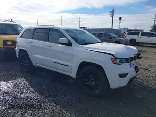 2018 Jeep Grand Cherokee Upland with VIN 1C4RJFAG9JC106126, listed as a IAAI auction lot 41402779 with 68,876 mi miles and . Bid and sale history available at DreamBid. Image 1.