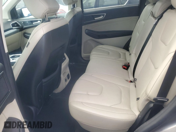 2021 Ford Edge Titanium z VIN 2FMPK3K92MBA53689, wystawiony jako IAAI lot #42501151 z przebiegiem 93 941 mil mil oraz . Historia ofert i sprzedaży dostępna na DreamBid. Obrazek 4.