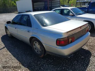1999 Cadillac Seville Luxury SLS with VIN 1G6KS54Y2XU925322, listed as a IAAI auction lot 41889695 with 150,587 mi miles. Bid and sale history available at carsss.com. Image 3.