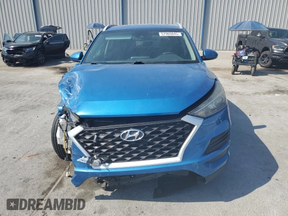 2019 Hyundai Tucson Value with VIN KM8J33A40KU025566, listed as a Copart auction lot 57965045 with 89,698 mi miles and Non repairable. Bid and sale history available at DreamBid. Image 5.