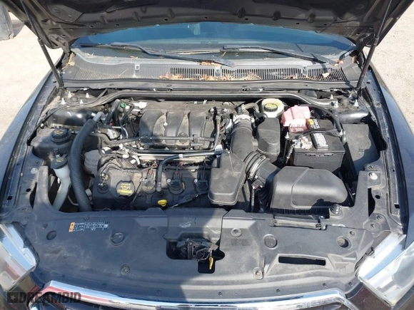 2013 Ford Taurus Limited with VIN 1FAHP2F85DG188511, listed as a IAAI auction lot 42077614 with 165,059 mi miles. Bid and sale history available at carsss.com. Image 10.