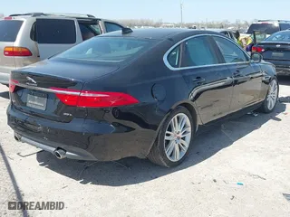 2016 Jaguar XF 35t Prestige with VIN SAJBE4BV8GCY02560, listed as a IAAI auction lot 41704209 with 109,917 mi miles. Bid and sale history available at carsss.com. Image 4.