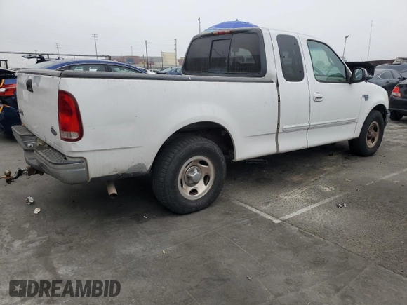 2000 Ford F-150 XL with VIN 1FTRX17L5YKA74815, listed as a Copart auction lot 85821444 with 0 mi miles and Salvage Title. Bid and sale history available at carsss.com. Image 3.