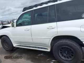 2004 Lexus LX 470 z VIN JTJHT00W043543915, wystawiony jako IAAI lot #41902858 z przebiegiem 110 454 mil mil oraz . Historia ofert i sprzedaży dostępna na DreamBid. Obrazek 15.