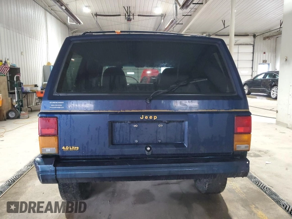 1995 Jeep Cherokee z VIN 1J4FN78S7SL537213, wystawiony jako Copart lot #58700105 z przebiegiem 261 606 mil mil oraz Szkoda całkowita • Salvage title. Historia ofert i sprzedaży dostępna na DreamBid. Obrazek 6.