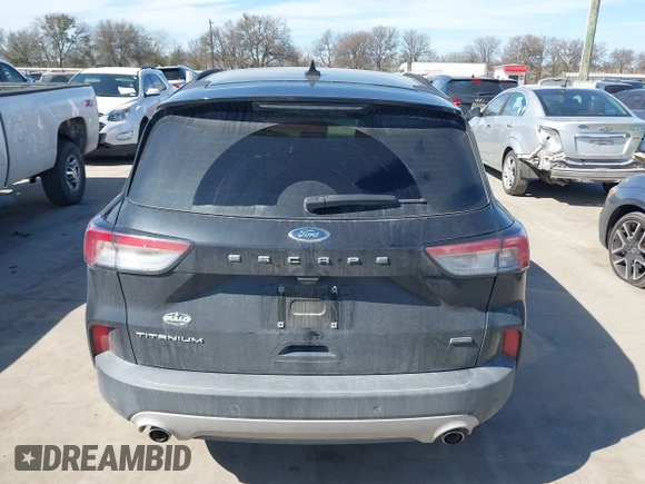 2020 Ford Escape Titanium Hybrid with VIN 1FMCU0DZ9LUC08090, listed as a IAAI auction lot 41674697 with 43,586 mi miles and . Bid and sale history available at DreamBid. Image 16.