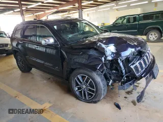2018 Jeep Grand Cherokee Limited with VIN 1C4RJFBG9JC299621, listed as a Copart auction lot 61395695 with 87,952 mi miles and Salvage title. Bid and sale history available at DreamBid. Image 4.