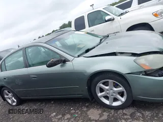 2005 Nissan Altima SE z VIN 1N4BL11DX5C234245, wystawiony jako IAAI lot #42169408 z przebiegiem 153 085 mil mil oraz . Historia ofert i sprzedaży dostępna na DreamBid. Obrazek 13.