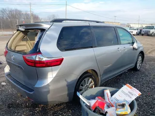 2017 Toyota Sienna LE with VIN 5TDJZ3DC6HS184126, listed as a IAAI auction lot 41166135 with 101,305 mi miles. Bid and sale history available at carsss.com. Image 4.