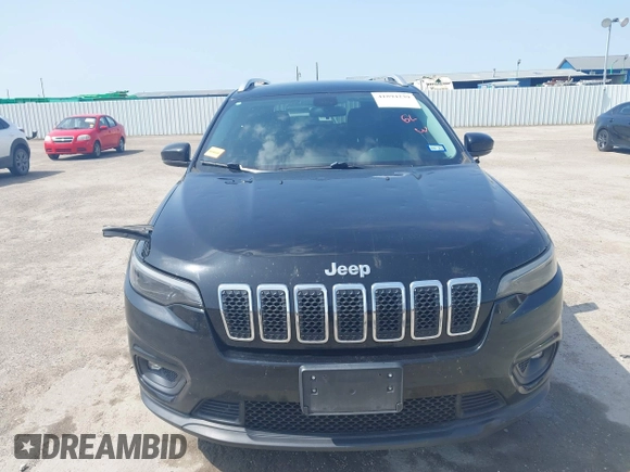 2019 Jeep Cherokee Latitude Plus with VIN 1C4PJLLB3KD377525, listed as a IAAI auction lot 41894239 with 143,711 mi miles and . Bid and sale history available at DreamBid. Image 12.