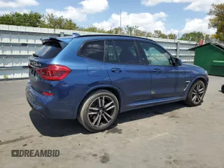 2020 BMW X3 M Competition z VIN 5YMTS0C04LLT10567, wystawiony jako Copart lot #54367805 z przebiegiem 53 055 mil mil oraz Szkoda całkowita • Salvage title. Historia ofert i sprzedaży dostępna na DreamBid. Obrazek 3.