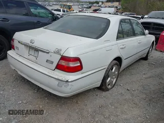 2000 Infiniti Q45 with VIN JNKBY31A9YM300780, listed as a IAAI auction lot 41950554 with 258,854 mi miles and . Bid and sale history available at DreamBid. Image 4.