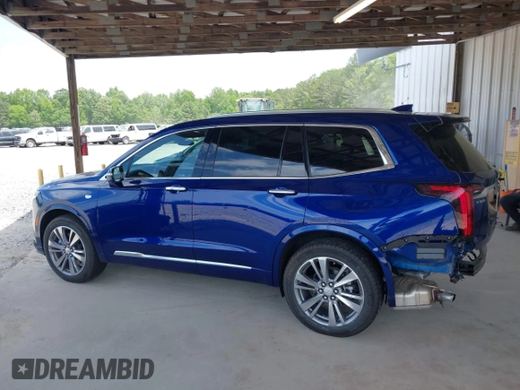 2025 Cadillac XT6 FWD Premium Luxury with VIN 1GYKPCRS5SZ119357, listed as a IAAI auction lot 42087218 with 11,352 mi miles. Bid and sale history available at carsss.com. Image 15.