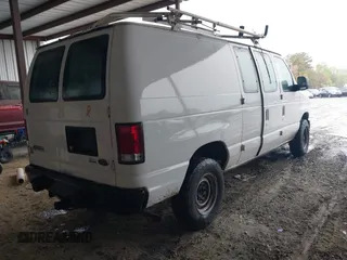 2009 Ford Econoline Cargo with VIN 1FTNE24W99DA34042, listed as a IAAI auction lot 41964410 with 284,031 mi miles and . Bid and sale history available at DreamBid. Image 4.
