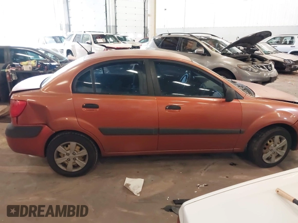 2009 Kia Rio LX with VIN KNADE223796547229, listed as a IAAI auction lot 41947371 with 153,061 mi miles and . Bid and sale history available at DreamBid. Image 13.