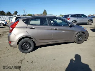 2014 Hyundai Accent GS with VIN KMHCT5AE1EU157401, listed as a Copart auction lot 87669115 with 139,984 mi miles and Salvage Title. Bid and sale history available at carsss.com. Image 3.