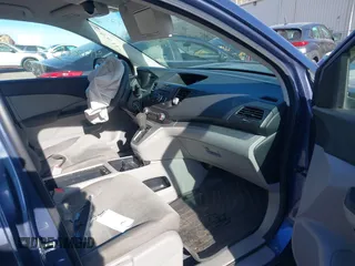 2014 Honda CR-V LX with VIN 2HKRM4H3XEH705576, listed as a IAAI auction lot 41280825 with 124,845 mi miles. Bid and sale history available at carsss.com. Image 5.