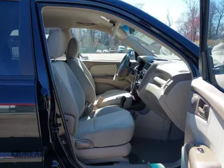 2007 Kia Sportage LX with VIN KNDJF724877313178, listed as a IAAI auction lot 41863492 with 199,138 mi miles. Bid and sale history available at carsss.com. Image 5.