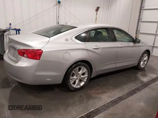 2014 Chevrolet Impala LT with VIN 2G1115SL4E9250806, listed as a IAAI auction lot 42119330 with 98,618 mi miles and . Bid and sale history available at DreamBid. Image 4.