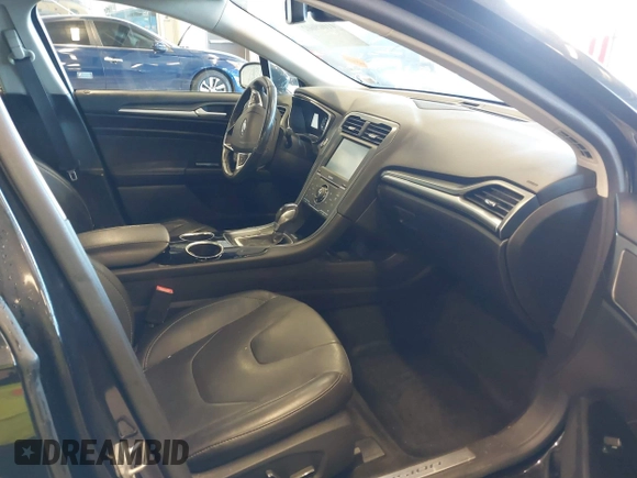 2014 Ford Fusion Titanium with VIN 3FA6P0K93ER115805, listed as a IAAI auction lot 41009602 with 136,021 mi miles. Bid and sale history available at carsss.com. Image 5.