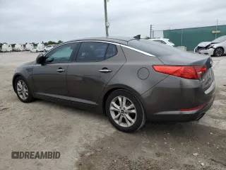 2011 Kia Optima EX with VIN KNAGN4A65B5139487, listed as a Copart auction lot 76731764 with Not Provided miles and Salvage Title. Bid and sale history available at carsss.com. Image 2.