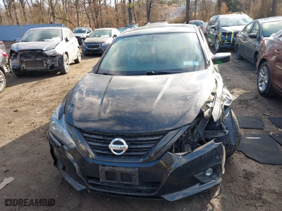 2018 Nissan Altima 2.5 SV with VIN 1N4AL3AP6JC244153, listed as a IAAI auction lot 41658699 with 54,486 mi miles. Bid and sale history available at carsss.com. Image 12.