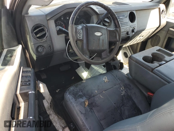 2012 Ford F-250 XL with VIN 1FT7W2A62CEA73065, listed as a Copart auction lot 76014634 with 162,703 mi miles and Salvage title. Bid and sale history available at DreamBid. Image 8.