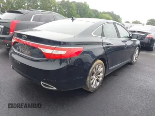 2012 Hyundai Azera z VIN KMHFG4JG1CA121395, wystawiony jako IAAI lot #42355924 z przebiegiem 107 084 mil mil oraz . Historia ofert i sprzedaży dostępna na DreamBid. Obrazek 4.